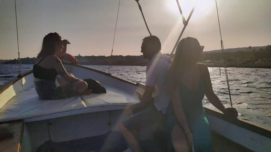 Aci Trezza boat tour sunset and dinner sicilian family home - Long-tail boat at 1 hour sunset: Isola Lachea to the Faraglioni