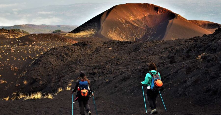 Catania: Etna Morning or Sunset Trek with Lava Tunnel & Gear - From central Catania to the start of the volcano