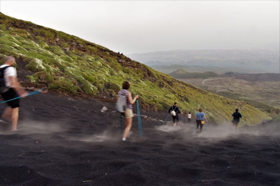 Catania: Etna Morning or Sunset Trek with Lava Tunnel & Gear - The lava tube part: helmet, flashlight, and what you’ll notice inside