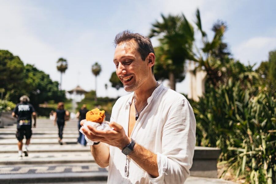 Catania: Guided Street Food Walking Tour - Piazza Duomo and Piazza Università: Squares, photos, and selz