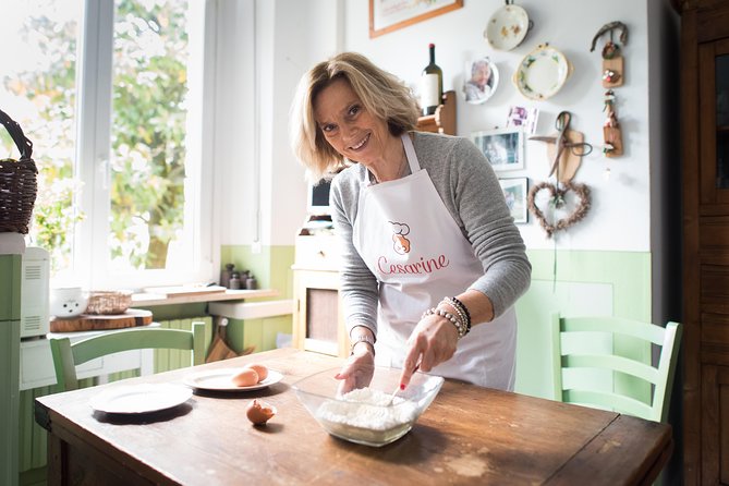 Cesarine: Market Tour & Home Cooking Class in Catania - The wine pairing makes dinner feel like a real meal