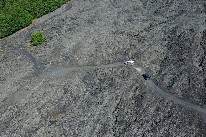 Etna Tour in 4x4 - Stop 1 on Etna: Ancient and Recent Lava, Side Craters, and a Lighted Cave