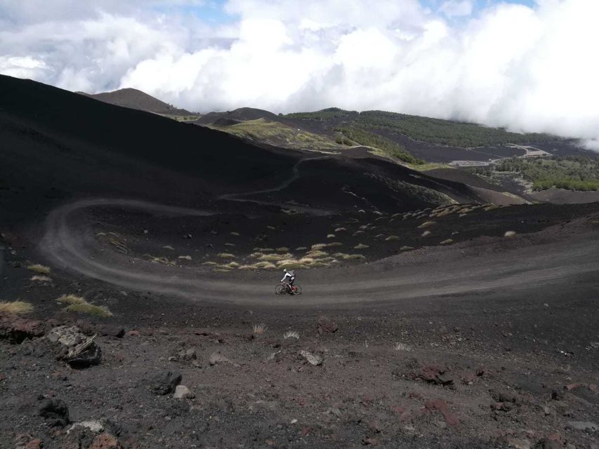 Mount Etna: Summit Cycling Tour - Etna’s dirt-path climb: lava flows, ancient craters, and that road-you-feel-in-your legs moment