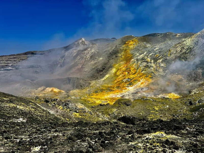Mount Etna: Summit Trekking Tour - The trek phase: hiking up to the summit area with volcanic terrain underfoot