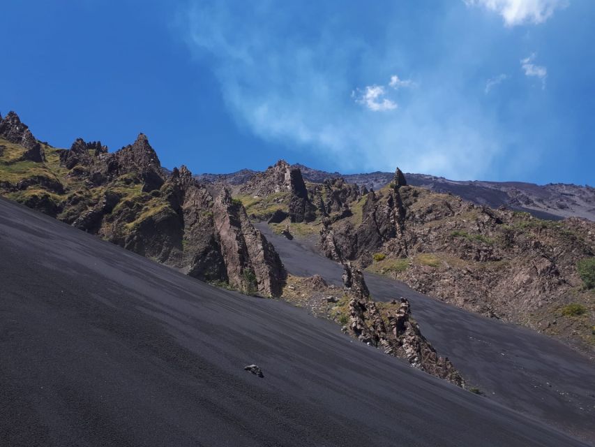 Mt Etna: Winter Trekking Tour with Optional Catania Transfer - Valle del Bove: the 10 km by 5 km lava basin you can feel